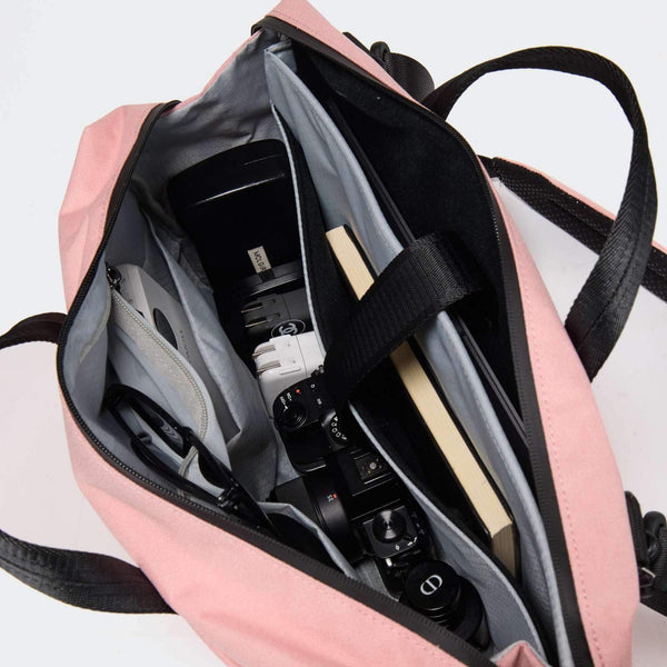 Pander 16-inch laptop work bag in Pink, main compartment holding work essentials