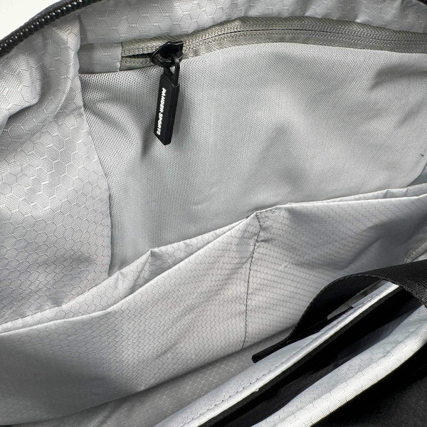 Pander 14L laptop messenger bag in Blue Storm, open organizer compartments
