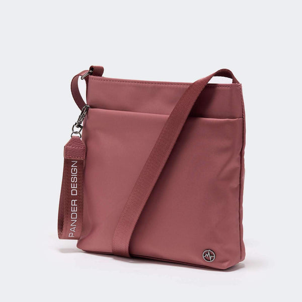 Pander small nylon crossbody bag in Dune, front view with shoulder strap