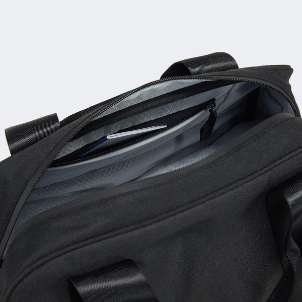 Pander Banwagon 23L duffel bag in Black Onyx, top zipper and pocket detail