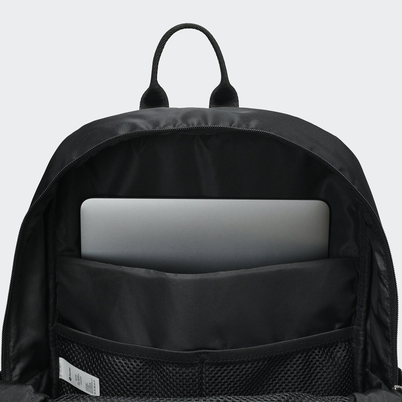 Pander 22L Black backpack interior tech sleeve and mesh organizer
