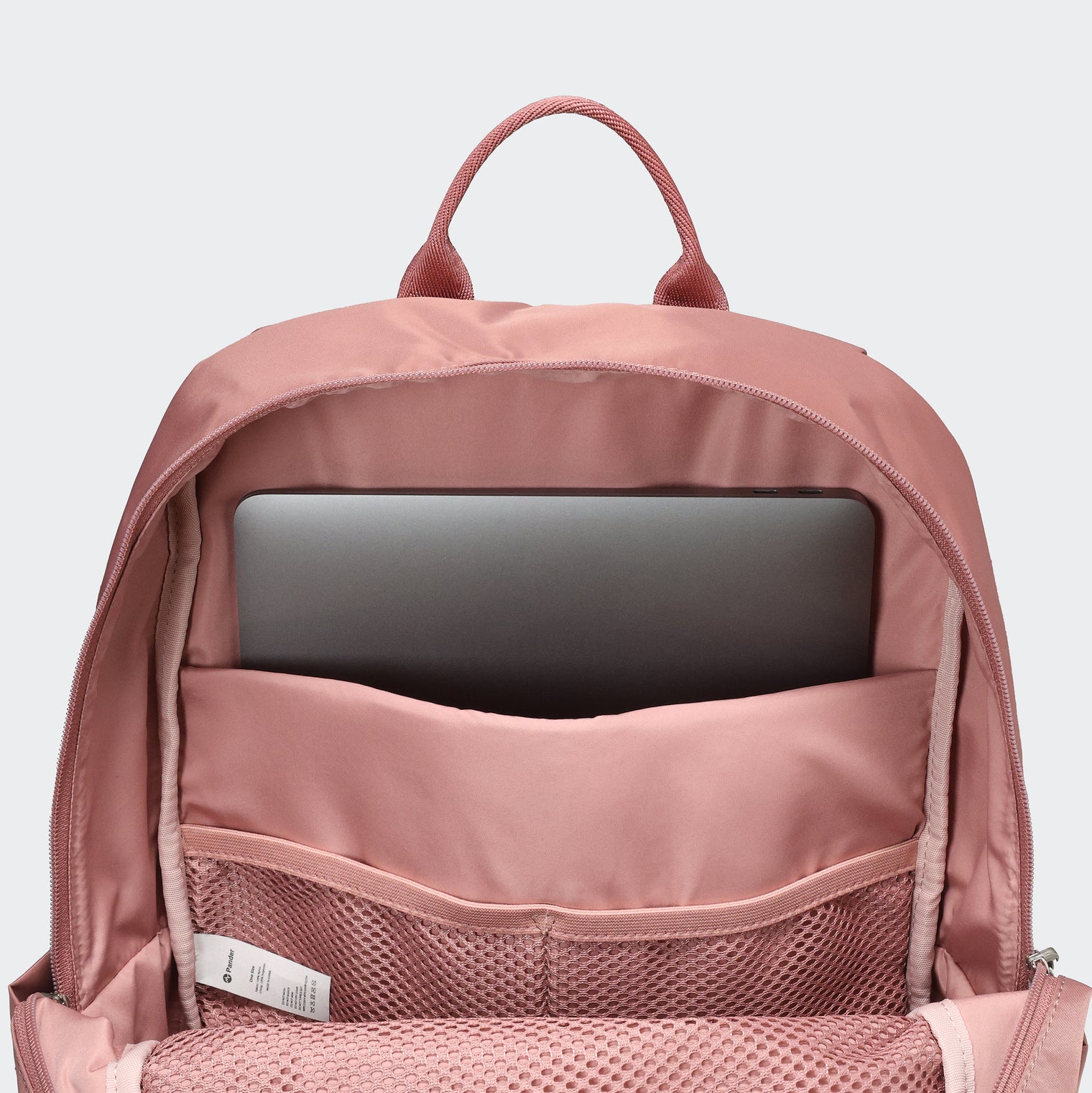Pander 22L Mauve backpack interior tech sleeve and mesh organizer