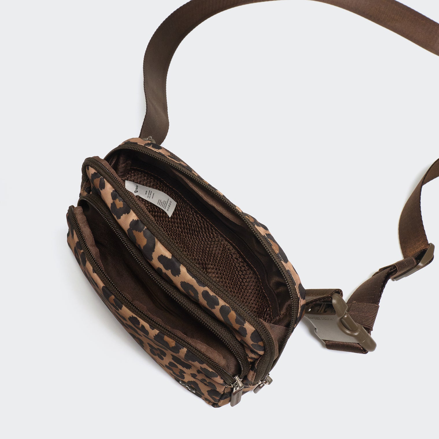 Pander 6-pocket crossbody belt bag in Leopard Multi interior