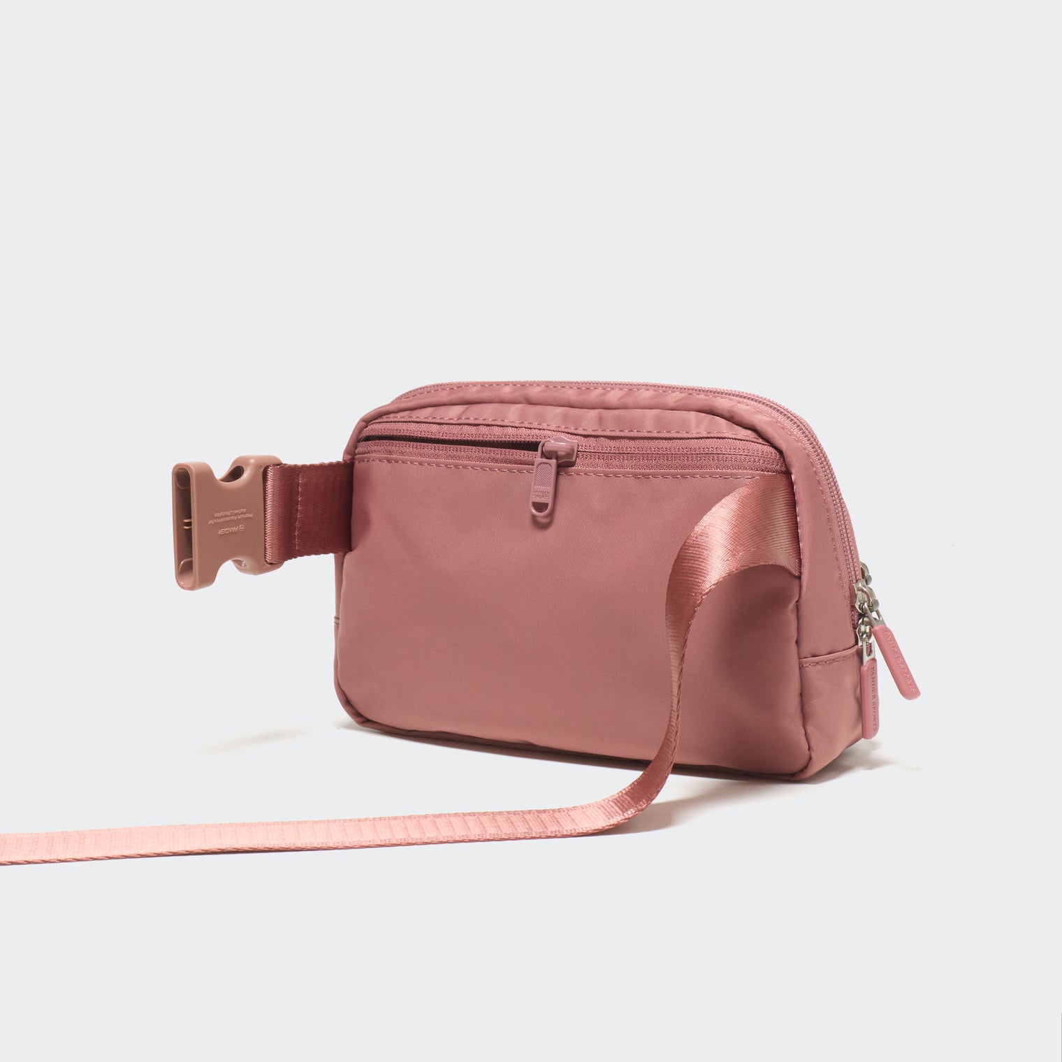 Pander 6-pocket crossbody belt bag in Mauve Pink back view