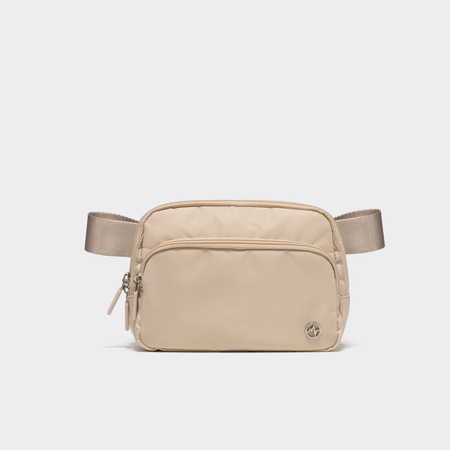 Pander 6-pocket crossbody belt bag in Warm Beige front view