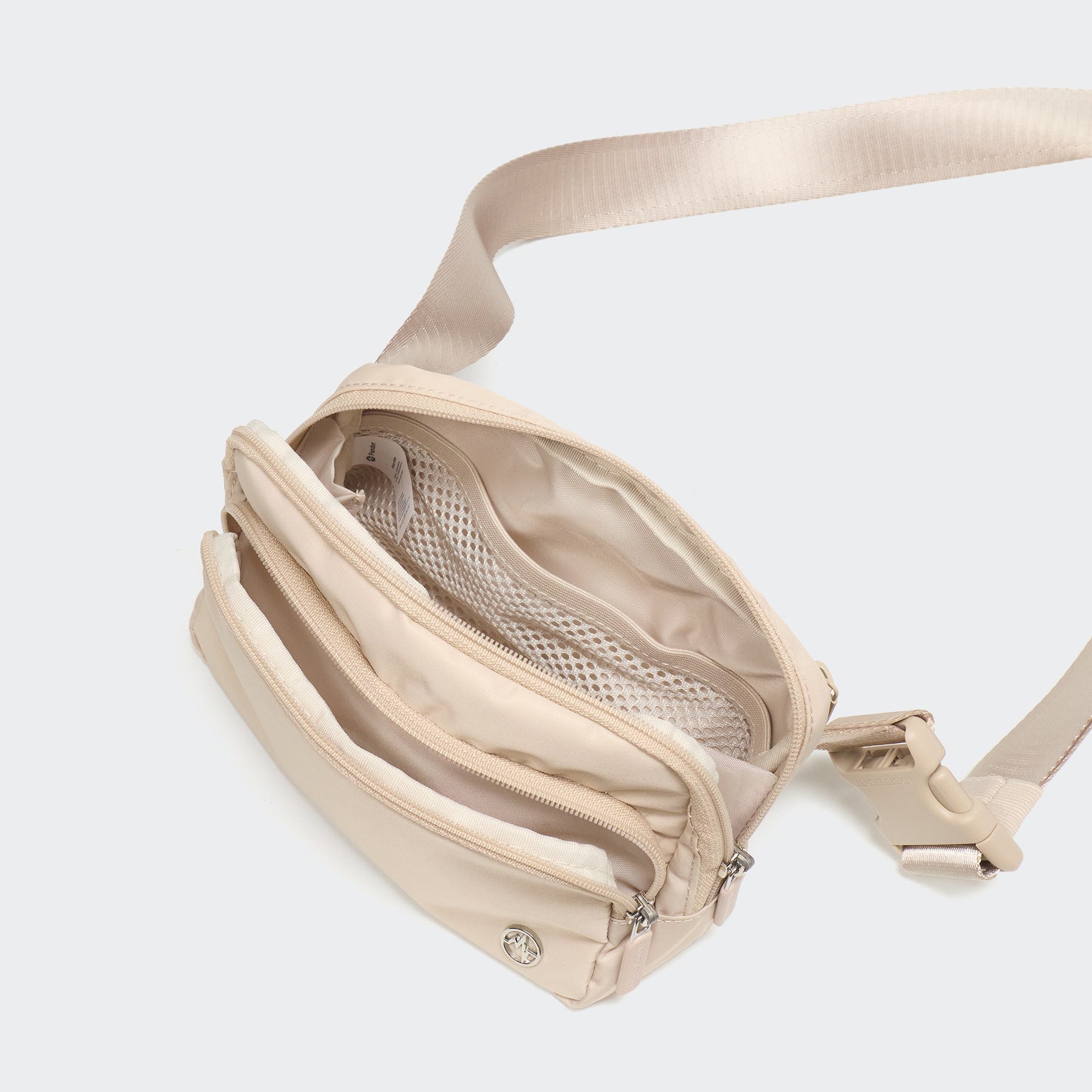 Pander 6-pocket crossbody belt bag in Warm Beige interior