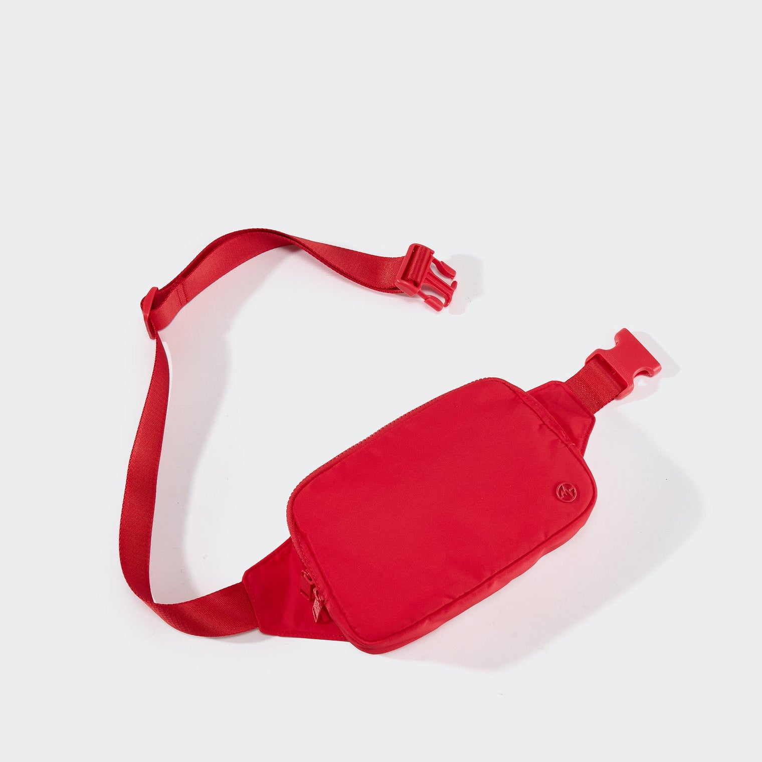 PANDER belt bag in Dark Salmon, rear zip pocket and buckle detail