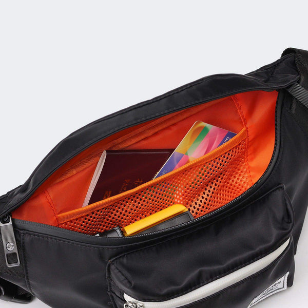 Pander G35 3.5L waist pack in Onyx Black, orange-lined organizer pockets