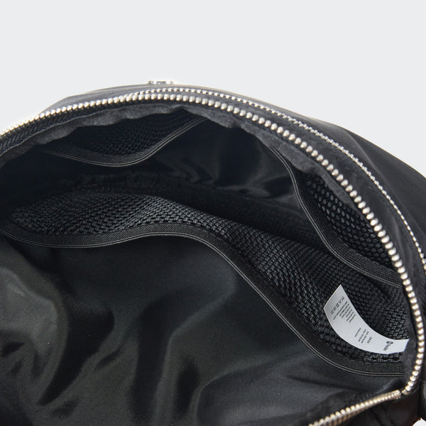 Pander crossbody bum bag in Black, open interior compartments