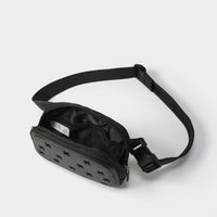 Black molded front belt bag with open main compartment and mesh organization pockets