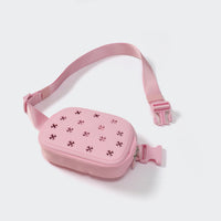 Pink molded front belt bag with adjustable strap and dual zipper, angled view