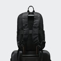 Pander 22L Black backpack rear luggage sleeve on suitcase handle