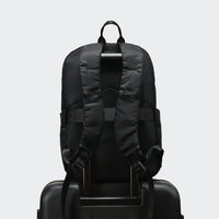 Pander 22L Black backpack rear luggage sleeve on suitcase handle