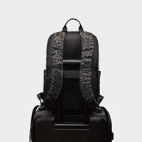 Pander 22L Grey Leopard backpack rear luggage sleeve on suitcase handle
