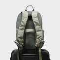 Pander 22L Grey Sage backpack rear luggage sleeve on suitcase handle