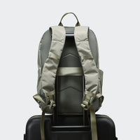 Pander 22L Grey Sage backpack rear luggage sleeve on suitcase handle