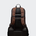 Pander 22L Midnight Leopard backpack rear luggage sleeve on suitcase handle