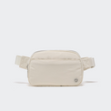 Pander 5 zipper pocket 2L belt bag in White Opal, front view with adjustable strap