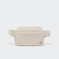 Pander 5 zipper pocket 2L belt bag in White Opal, front view with adjustable strap