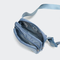 Pander 6-pocket crossbody belt bag in Blue interior