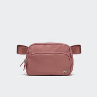 Pander 6-pocket crossbody belt bag in Mauve Pink front view