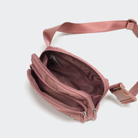 Pander 6-pocket crossbody belt bag in Mauve Pink interior