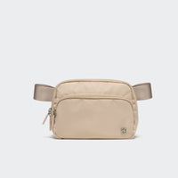 Pander 6-pocket crossbody belt bag in Warm Beige front view