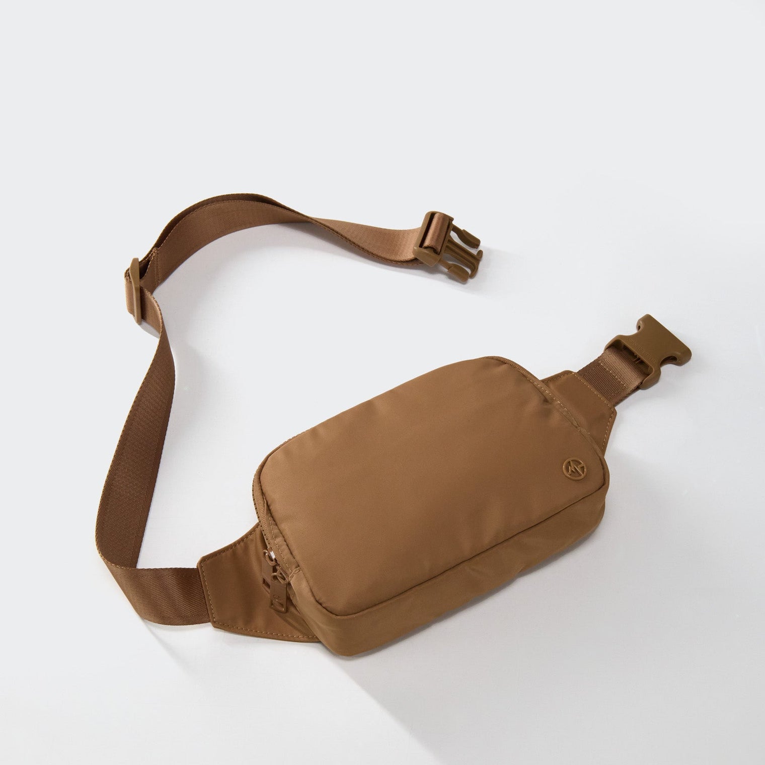 PANDER belt bag in Caramel Brown, rear zip pocket and buckle detail