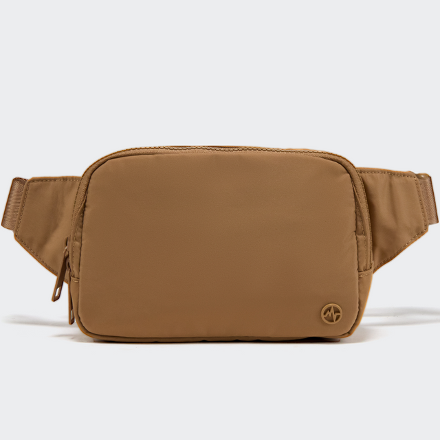 PANDER Everywhere Belt Bag Large 2L in Caramel Brown, straight-on front view on #ECEDEF background