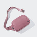 PANDER belt bag in Dune Pink, rear zip pocket and buckle detail