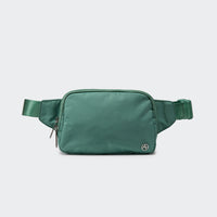 PANDER 2L water-resistant belt bag in Eucalyptus Green, side and zipper detail