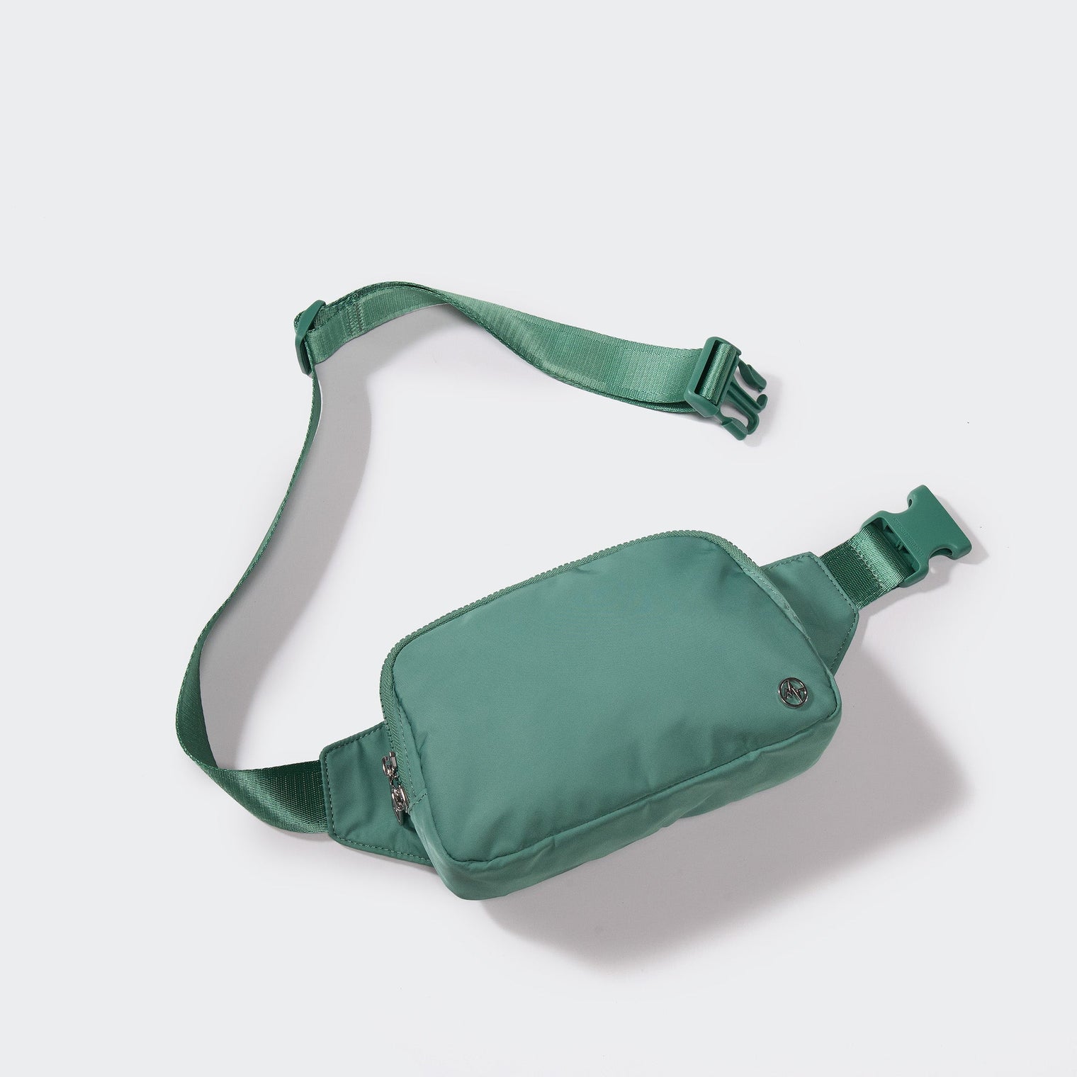 PANDER belt bag in Eucalyptus Green, rear zip pocket and buckle detail