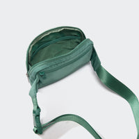 PANDER unisex 2L belt bag in Eucalyptus Green, everyday travel view