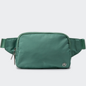 PANDER Everywhere Belt Bag Large 2L in Eucalyptus Green, straight-on front view on #ECEDEF background