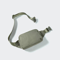 PANDER belt bag in Grey Sage, rear zip pocket and buckle detail