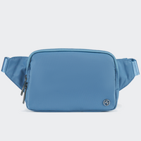 PANDER Everywhere Belt Bag Large 2L in Pale Turquoise, straight-on front view on #ECEDEF background