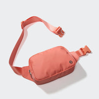 PANDER belt bag in Pink, rear zip pocket and buckle detail
