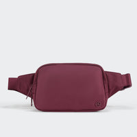 PANDER 2L water-resistant belt bag in Red Merlot, side and zipper detail