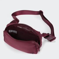 PANDER unisex 2L belt bag in Red Merlot, everyday travel view