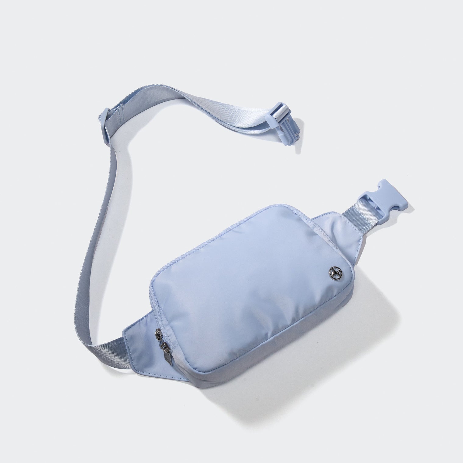 PANDER belt bag in Windmill Blue, rear zip pocket and buckle detail